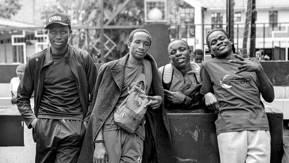 Young men from the community standing together